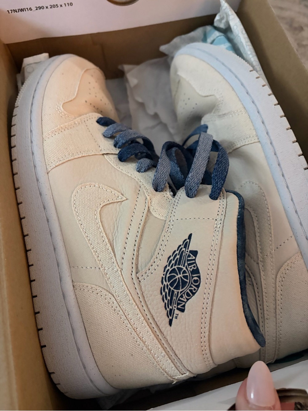 Jordan Women’s High-Top Sneakers in Cream with Navy Accents